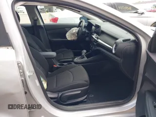 2021 Kia Forte LXS with VIN 3KPF24AD4ME302515, listed as a IAAI auction lot 42204617 with 33,354 mi miles and . Bid and sale history available at DreamBid. Image 5.