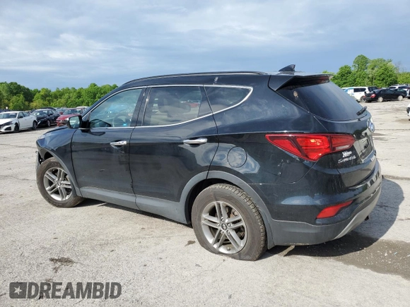 2017 Hyundai Santa Fe 2.4L z VIN 5XYZUDLB1HG412675, wystawiony jako Copart lot #57169045 z przebiegiem 38 947 mil mil oraz Szkoda całkowita • Salvage title. Historia ofert i sprzedaży dostępna na DreamBid. Obrazek 2.