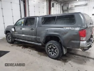 2016 Toyota Tacoma SR5 with VIN 3TMDZ5BNXGM009423, listed as a IAAI auction lot 41008068 with 107,426 mi miles and . Bid and sale history available at DreamBid. Image 14.