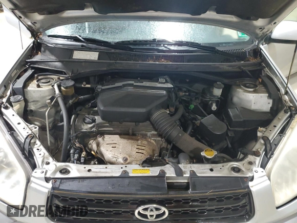 2001 Toyota RAV4 z VIN JTEGH20V610015422, wystawiony jako Copart lot #57053185 z przebiegiem 197 829 mil mil oraz Szkoda całkowita • Salvage title. Historia ofert i sprzedaży dostępna na DreamBid. Obrazek 12.