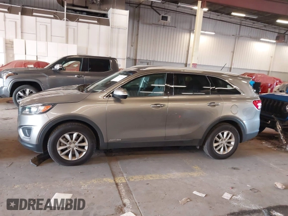 2017 Kia Sorento LX with VIN 5XYPGDA57HG199307, listed as a IAAI auction lot 41967654 with 88,112 mi miles and . Bid and sale history available at carsss.com. Image 14.