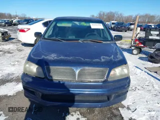 2003 Mitsubishi Lancer ES with VIN JA3AJ26E13U0A3996, listed as a IAAI auction lot 41251250 with 223,311 mi miles. Bid and sale history available at carsss.com. Image 11.