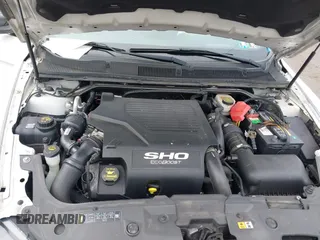 2014 Ford Taurus SHO with VIN 1FAHP2KT9EG107862, listed as a IAAI auction lot 42266313 with Not provided miles and . Bid and sale history available at DreamBid. Image 10.