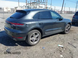2021 Porsche Macan with VIN WP1AA2A58MLB04780, listed as a IAAI auction lot 41674377 with 55,946 mi miles and . Bid and sale history available at DreamBid. Image 4.
