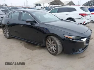 2021 Mazda 3 Premium with VIN JM1BPADL4M1329041, listed as a IAAI auction lot 42291604 with 93,248 mi miles and . Bid and sale history available at DreamBid. Image 1.