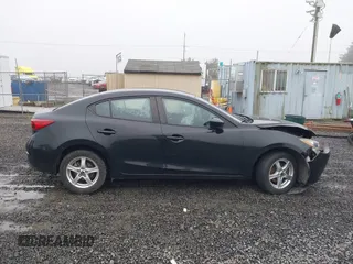 2015 Mazda 3 i SV with VIN JM1BM1T73F1243820, listed as a IAAI auction lot 41167112 with 126,063 mi miles. Bid and sale history available at carsss.com. Image 14.