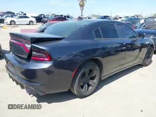 2016 Dodge Charger SXT with VIN 2C3CDXHG2GH246182, listed as a IAAI auction lot 41818735 with 111,138 mi miles and . Bid and sale history available at carsss.com. Image 4.