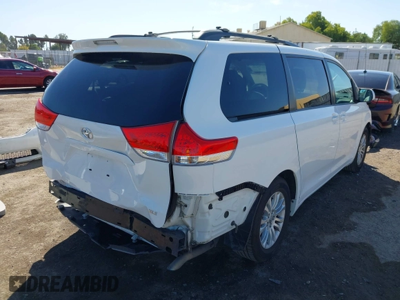 2012 Toyota Sienna XLE AAS with VIN 5TDYK3DC6CS240285, listed as a IAAI auction lot 42778248 with 122,091 mi miles and . Bid and sale history available at DreamBid. Image 4.
