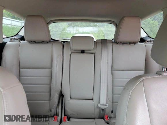 2014 Ford Escape Titanium с VIN 1FMCU0J97EUA87342, выставлен на аукционе Copart как лот 58790145 с пробегом 174 663 миль миль и Чистый • Clean title. История ставок и продаж доступна на DreamBid. Изображение 10.