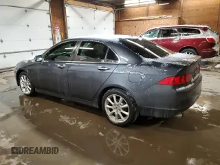 2007 Acura TSX w/Navigation with VIN JH4CL959X7C019694, listed as a Copart auction lot 83245584 with 199,386 mi miles and Salvage title. Bid and sale history available at DreamBid. Image 2.