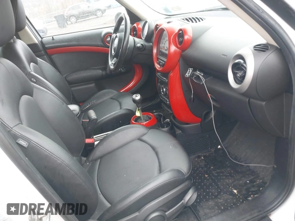2012 MINI Countryman S with VIN WMWZC5C52CWM12275, listed as a IAAI auction lot 42014546 with 147,494 mi miles and . Bid and sale history available at DreamBid. Image 5.