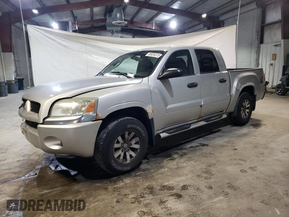 2007 Mitsubishi Raider LS z VIN 1Z7HT28KX7S216386, wystawiony jako Copart lot #88034315 z przebiegiem 162 337 mil mil oraz Czysty tytuł • Clean title. Historia ofert i sprzedaży dostępna na DreamBid. Obrazek 1.