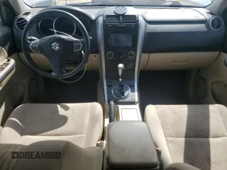 2013 Suzuki Grand Vitara Premium z VIN JS3TE0D62D4100310, wystawiony jako Copart lot #54916065 z przebiegiem 116 428 mil mil oraz Szkoda całkowita • Salvage title. Historia ofert i sprzedaży dostępna na DreamBid. Obrazek 8.