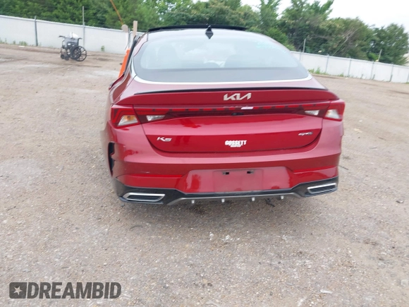 2022 Kia K5 GT-Line z VIN 5XXG64J29NG121197, wystawiony jako IAAI lot #39659829 z przebiegiem 49 590 mil mil oraz . Historia ofert i sprzedaży dostępna na DreamBid. Obrazek 16.