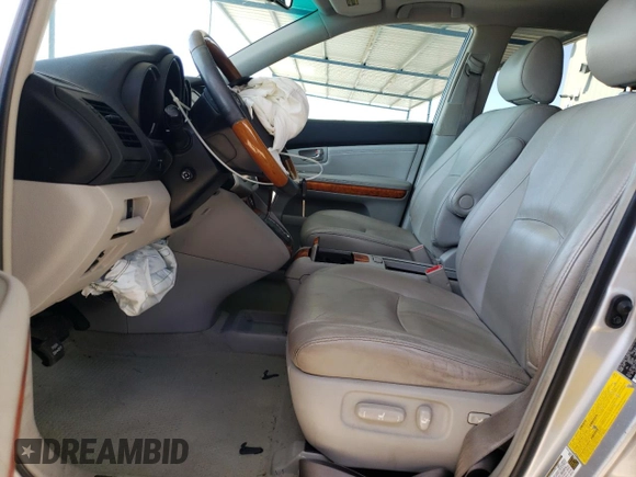 2009 Lexus RX 350 with VIN 2T2HK31U69C122392, listed as a Copart auction lot 52439995 with 185,463 mi miles and Salvage Title. Bid and sale history available at DreamBid. Image 7.