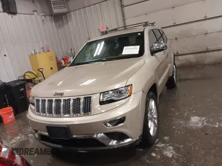 2015 Jeep Grand Cherokee Summit with VIN 1C4RJFJG5FC918837, listed as a IAAI auction lot 41126436 with 155,516 mi miles. Bid and sale history available at carsss.com. Image 13.