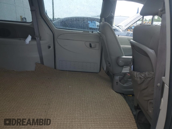 2005 Dodge Caravan SXT with VIN 2D4GP44L45R260651, listed as a Copart auction lot 55804905 with 131,795 mi miles and Salvage Title. Bid and sale history available at DreamBid. Image 11.