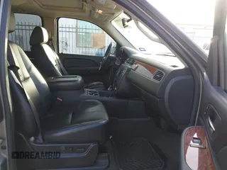 2008 GMC Yukon SLT w/4SB with VIN 1GKFK13078R227526, listed as a IAAI auction lot 41830004 with 143,728 mi miles. Bid and sale history available at carsss.com. Image 5.