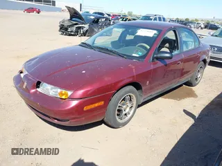 2002 Saturn SL with VIN 1G8ZK527X2Z276722, listed as a IAAI auction lot 42721685 with 126,462 mi miles and . Bid and sale history available at DreamBid. Image 2.