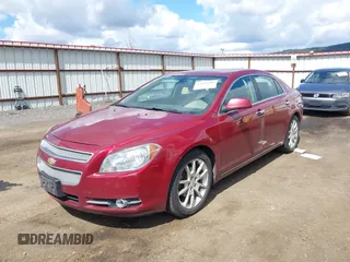 2011 Chevrolet Malibu LTZ with VIN 1G1ZE5E1XBF119559, listed as a IAAI auction lot 42095401 with 145,157 mi miles and . Bid and sale history available at DreamBid. Image 2.