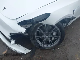 2024 Tesla Model Y Long Range z VIN 7SAYGDEEXRF230169, wystawiony jako IAAI lot #41723049 z przebiegiem Nie podano mil oraz . Historia ofert i sprzedaży dostępna na DreamBid. Obrazek 6.