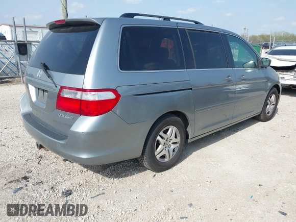 2005 Honda Odyssey EX-L with VIN 5FNRL38755B014826, listed as a IAAI auction lot 42147100 with 145,484 mi miles. Bid and sale history available at carsss.com. Image 4.