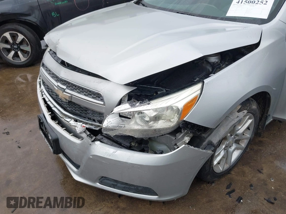 2013 Chevrolet Malibu LT with VIN 1G11C5SA9DF331802, listed as a IAAI auction lot 41500252 with 151,446 mi miles and . Bid and sale history available at DreamBid. Image 12.