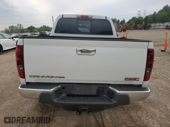 2011 GMC Canyon SLE1 with VIN 1GTH5MFEXB8129303, listed as a Copart auction lot 58571285 with 175,338 mi miles and Salvage title. Bid and sale history available at DreamBid. Image 6.