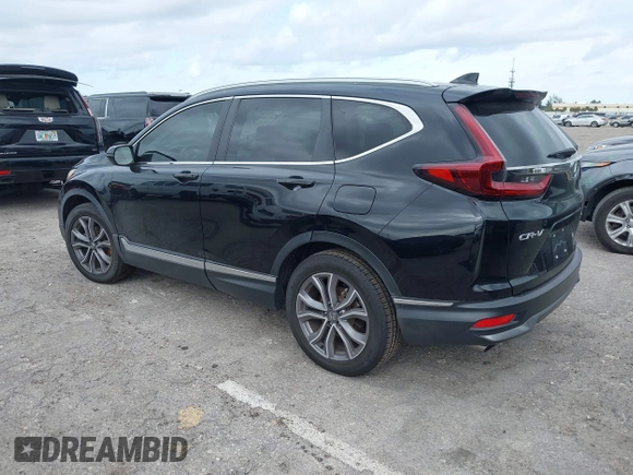 2021 Honda CR-V Touring with VIN 2HKRW1H91MH410751, listed as a IAAI auction lot 41286168 with 56,314 mi miles. Bid and sale history available at carsss.com. Image 3.