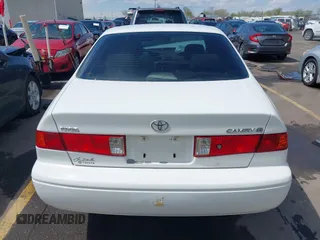 2001 Toyota Camry CE with VIN JT2BG22K210571000, listed as a IAAI auction lot 42061153 with 203,182 mi miles. Bid and sale history available at carsss.com. Image 16.