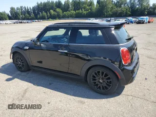 2016 MINI Hardtop S with VIN WMWXP7C5XG3B33500, listed as a Copart auction lot 65537105 with 114,984 mi miles and Salvage title. Bid and sale history available at DreamBid. Image 2.