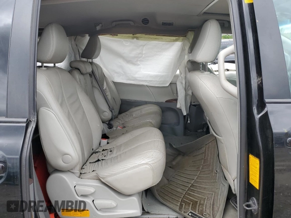 2012 Toyota Sienna XLE AAS z VIN 5TDYK3DC7CS263011, wystawiony jako Copart lot #58335465 z przebiegiem 229 319 mil mil oraz Czysty tytuł • Clean title. Historia ofert i sprzedaży dostępna na DreamBid. Obrazek 11.