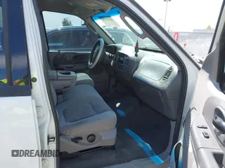 2003 Ford F-150 XLT with VIN 1FTRW08L23KD35077, listed as a IAAI auction lot 42071330 with 1 mi miles. Bid and sale history available at carsss.com. Image 5.
