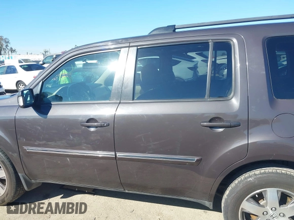 2015 Honda Pilot Touring with VIN 5FNYF3H94FB002236, listed as a IAAI auction lot 41735221 with 112,766 mi miles. Bid and sale history available at carsss.com. Image 14.