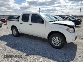 2016 Nissan Frontier SV with VIN 1N6AD0EV9GN796576, listed as a Copart auction lot 50412155 with 123,560 mi miles and Salvage title. Bid and sale history available at DreamBid. Image 4.