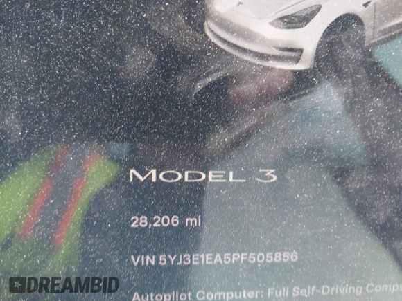 2023 Tesla Model 3 with VIN 5YJ3E1EA5PF505856, listed as a IAAI auction lot 41885837 with 28,206 mi miles and . Bid and sale history available at carsss.com. Image 14.