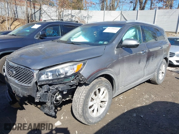 2016 Kia Sorento LX with VIN 5XYPGDA39GG061748, listed as a IAAI auction lot 41720011 with 124,084 mi miles. Bid and sale history available at carsss.com. Image 2.