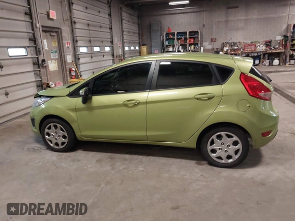 2013 Ford Fiesta SE with VIN 3FADP4EJ9DM131913, listed as a IAAI auction lot 41677333 with 54,673 mi miles. Bid and sale history available at carsss.com. Image 14.