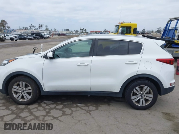 2018 Kia Sportage LX with VIN KNDPM3AC1J7413227, listed as a IAAI auction lot 42188566 with 77,897 mi miles and . Bid and sale history available at carsss.com. Image 14.
