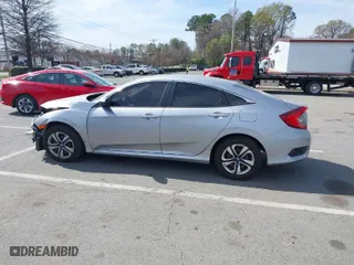 2019 Honda Civic Sedan LX with VIN 2HGFC2F62KH555430, listed as a IAAI auction lot 41844345 with 40,025 mi miles. Bid and sale history available at carsss.com. Image 14.