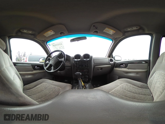 2004 GMC Envoy SLE with VIN 1GKDS13S142202004, listed as a IAAI auction lot 41921818 with 231,912 mi miles and . Bid and sale history available at DreamBid. Image 18.