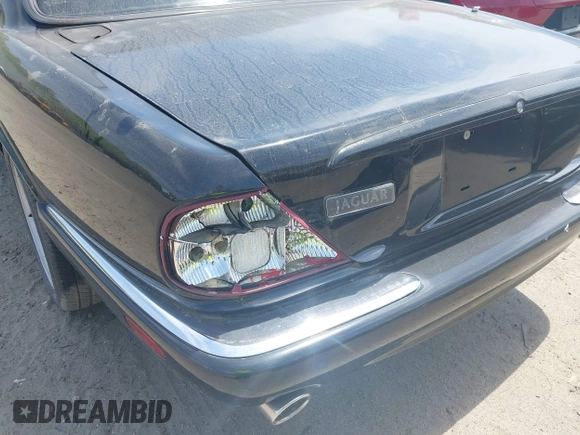 1999 Jaguar XJ with VIN SAJPX1841XC864072, listed as a IAAI auction lot 42176220 with 122,712 mi miles and . Bid and sale history available at DreamBid. Image 6.