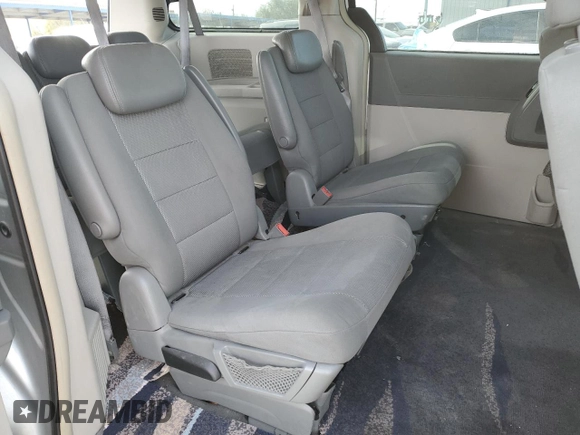 2009 Dodge Grand Caravan SXT z VIN 2D8HN54159R620187, wystawiony jako Copart lot #84703224 z przebiegiem 206 240 mil mil oraz Szkoda całkowita • Salvage title. Historia ofert i sprzedaży dostępna na DreamBid. Obrazek 11.