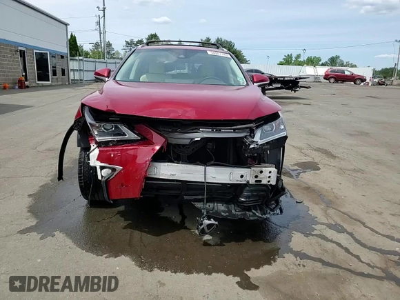 2019 Lexus RX 350 z VIN JTJBZMCA0K2041162, wystawiony jako Copart lot #58007785 z przebiegiem 110 563 mil mil oraz Szkody całkowita. Historia ofert i sprzedaży dostępna na DreamBid. Obrazek 14.