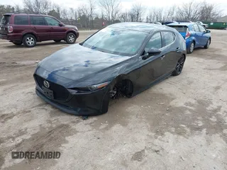 2021 Mazda 3 2.5 Turbo with VIN JM1BPBJY0M1344335, listed as a IAAI auction lot 42008145 with 71,452 mi miles and . Bid and sale history available at DreamBid. Image 2.