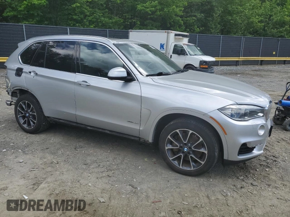 2017 BMW X5 xDrive50i with VIN 5UXKR6C53H0J84790, listed as a Copart auction lot 55818125 with 158,087 mi miles and Salvage title. Bid and sale history available at DreamBid. Image 4.