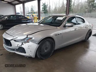 2017 Maserati Ghibli with VIN ZAM57XSLXH1238134, listed as a IAAI auction lot 41871754 with 34,776 mi miles. Bid and sale history available at carsss.com. Image 16.