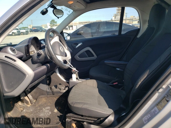 2013 Smart fortwo Pure with VIN WMEEJ3BA6DK674305, listed as a Copart auction lot 56100835 with 78,158 mi miles and Salvage title. Bid and sale history available at DreamBid. Image 7.