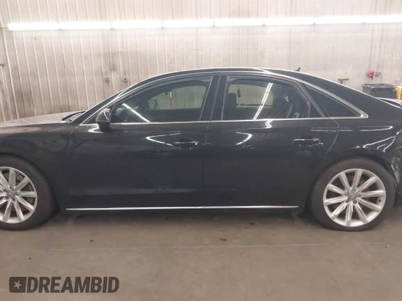 2012 Audi A8 with VIN WAUAVAFD3CN009835, listed as a IAAI auction lot 41816293 with Not provided miles and . Bid and sale history available at DreamBid. Image 14.