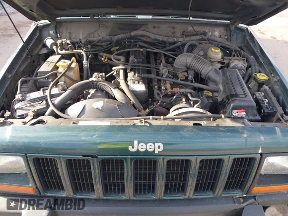 2000 Jeep Cherokee Classic with VIN 1J4FF58S6YL105920, listed as a IAAI auction lot 41497047 with 192,410 mi miles. Bid and sale history available at carsss.com. Image 10.